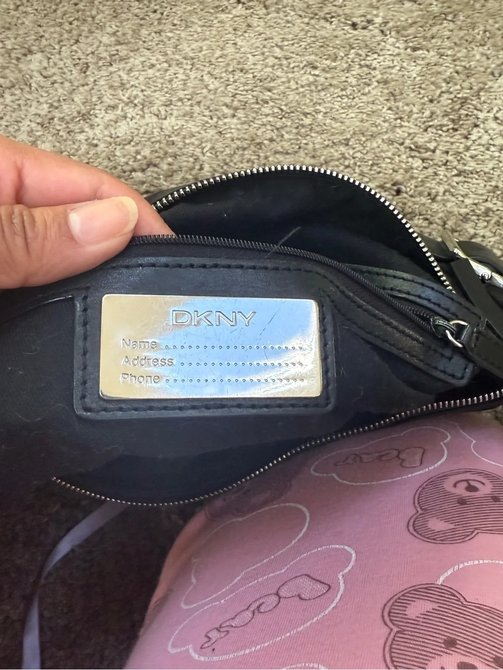 DKNY Black Monogram Messenger Bag with Gold Buckle Accents